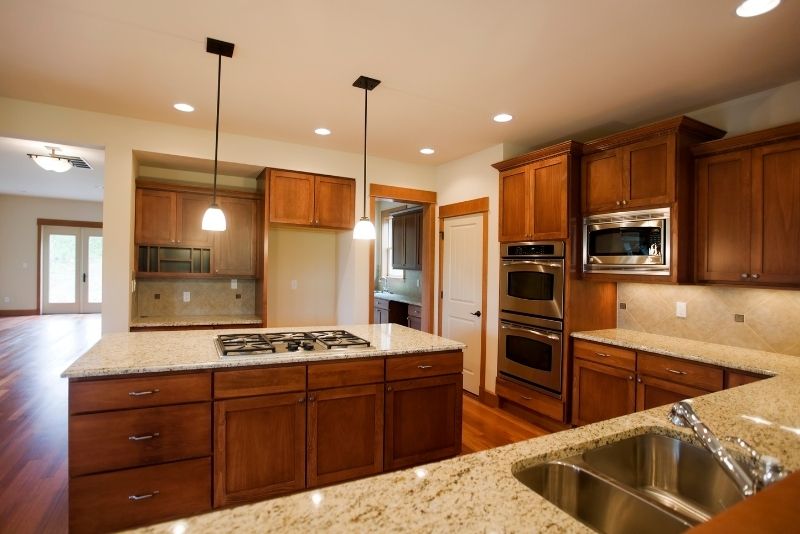 A custom made kitchen with a kitchen island